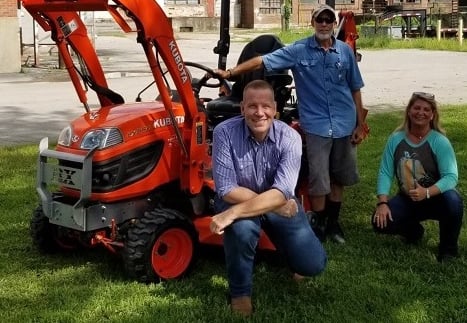 customor photo with a Kubota equipment